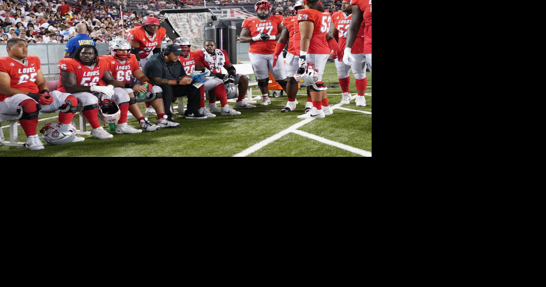 UNM offensive line giving back with turkey drive