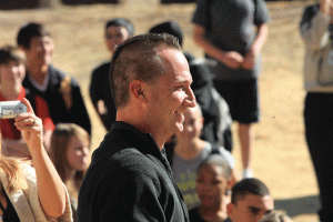 Students collect canned food to give their teacher a Mohawk 