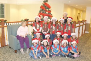 Local Brownie and Daisy troops bring joy with caroling