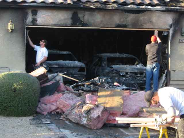 Garage, two cars go up in flames 