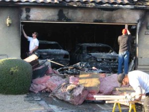 Garage, two cars go up in flames 