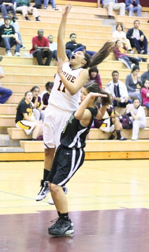 Villescaz delays softball for MP hoops playoff run 