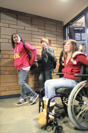 Mackenzie Saunders returns to school 