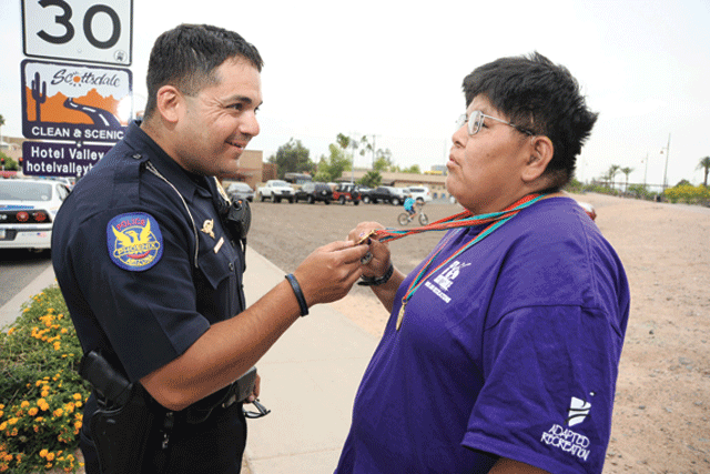 Cops become servers to help Special Olympics 