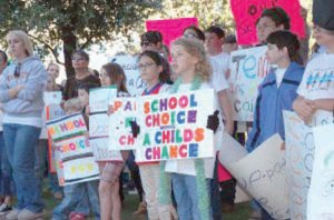 Attorney, justices wrangle over school vouchers