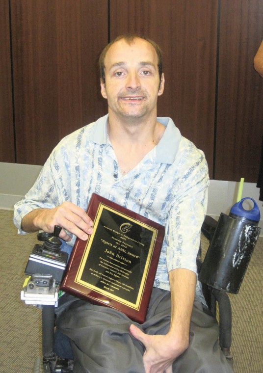 John Britton receives Spirit of ABIL Award