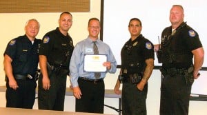 Local insurance agent receives police award 