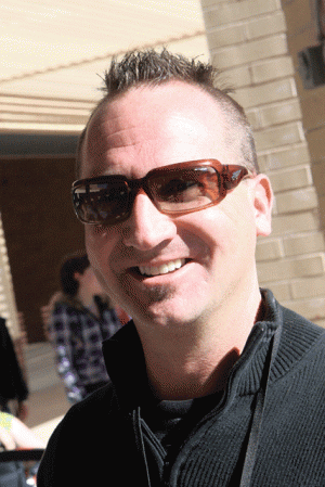 Students collect canned food to give their teacher a Mohawk 