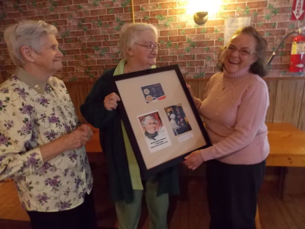 From the Auburn Citizen: New Summerhill town historian Patricia McCloy, right, smiles during a presentation by the Cayuga Owasco Lakes Historical Society as retiring town historian Florence Lansdowne, left, and society President Joyce Hackett Smith-Moore look on. (Photo by Jessica Soule)