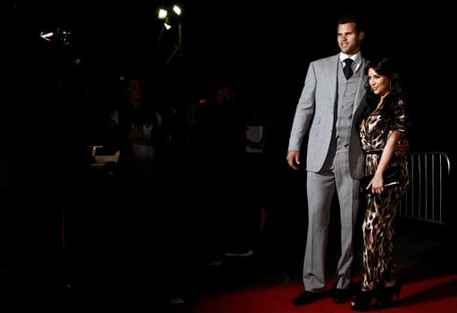 Kim Kardashian right and her fiance NBA basketball player Kris Humphries 