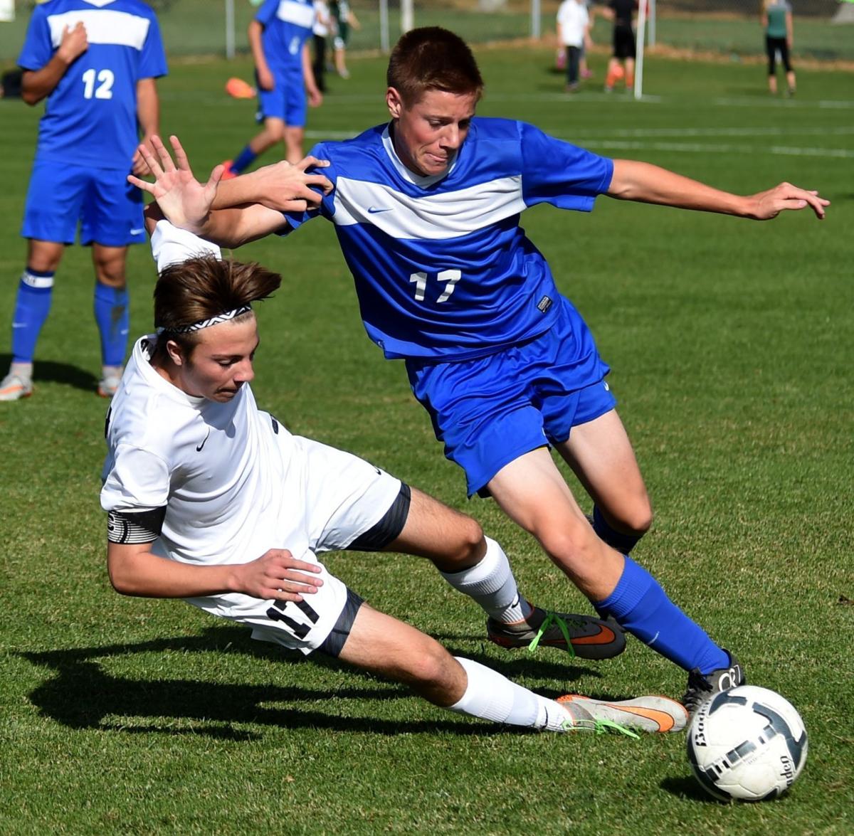 Central's Josh Bundy and Corvallis' Kolton Mahan