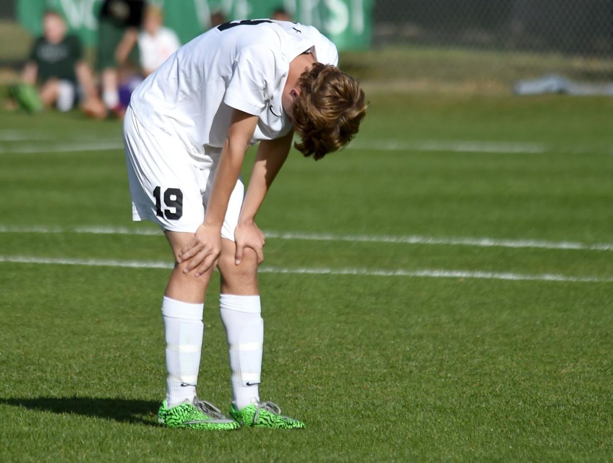 Central's Isaac Meyer bends in defeat