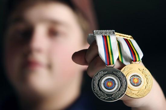 Teen grabs gold in <b>international archery</b> - 0e54bf74-1ef7-5239-8b1f-573f912228b8.image