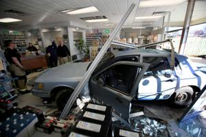 Car crashes through front window of battery business in Billings