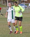 Central's Randi White, 1, and Hadley Ryan, 8, celebrate  their playoff win