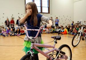 Bike giveaway brings Christmas to McKinley Elementary early