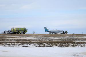 Twin-engine plane makes emergency landing at airport when landing gear collapses