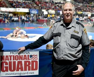 Former game warden angles for a well-behaved wrestling crowd