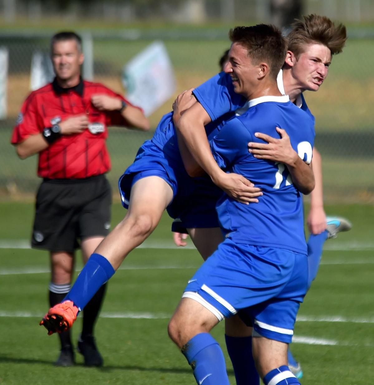 Brennan Williams and Avery Walden celebrate a goal