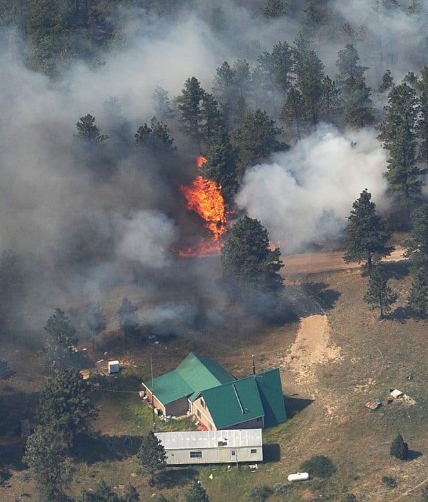 Homes threatened by the expanding Dahl fire