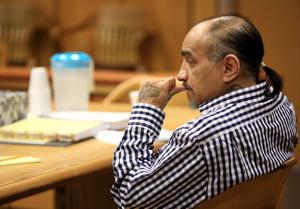 Man convicted of killing wife in 1990 on trial for domestic violence assault