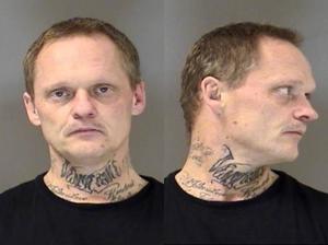 Parents arrested after state workers find syringe in daughter's marker bag