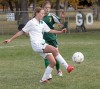 Central's Allie Lucas, 3, and Whitefish's Caroline Carbo, 10, battle for the header