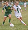 Central's Mariah Wittman, 24, and Whitefish's Sara Craven, 16, battle for the ball