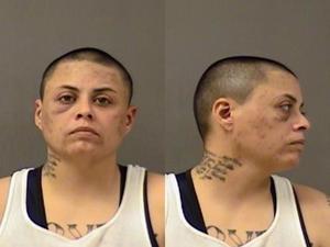 Woman charged in connection to check forgery ring