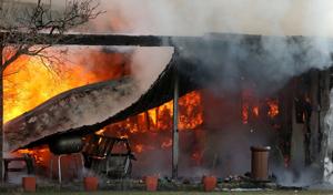 Huntley trailer home destroyed in fire apparently caused by electrical problem with freezer