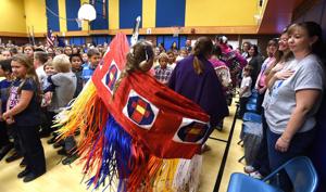 Sandstone Elementary students honor veterans with dance, drum circle