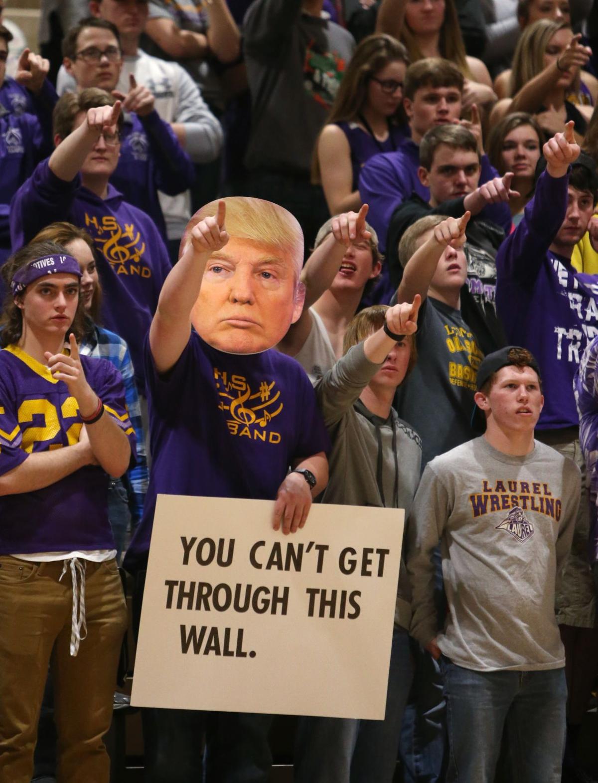 Donald Trump mask and sign