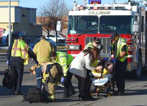 Woman hit by car on Grand Avenue