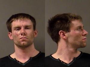 Suspect in failed bar robbery now accused of following woman, shooting her front door