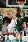 Blayne Sandau (22) and Daniel Meyer of Central defend
