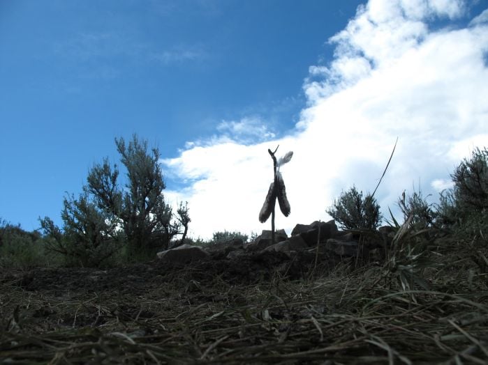 Remains of ancient child ceremoniously reburied