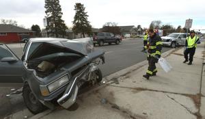 Grand Avenue crash sends 2 men to hospital
