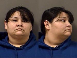 Charges: Woman slams officer's fingers in door prior to arrest