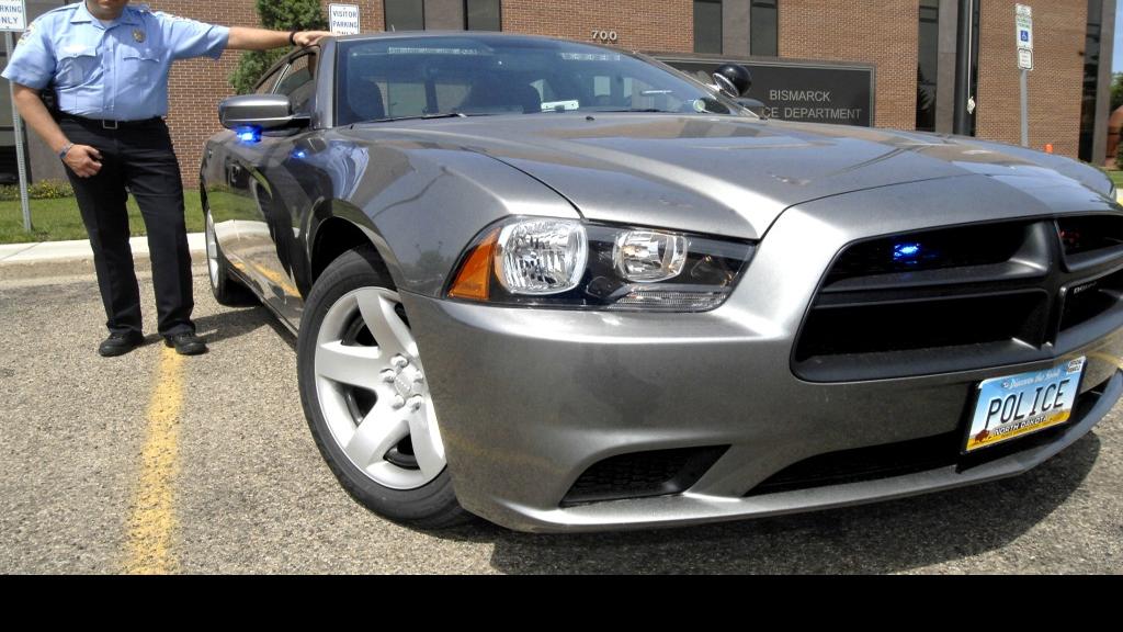 Lt. Steve Kilde with new Bismarck Police Department squad car Tribune