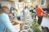 <p>Volunteers fill baskets with food during Bozeman's Bountiful Baskets Food Co-op distribution on Saturday at The Commons at Baxter &amp; Love.</p><p></p>
