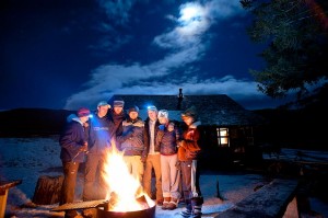 <p>A campfire keeps, from right, Sue Bogenschutz, Andrea DeNucci,
Andrew Babcock, Nando Velez, Matt Stark, Dave French and Christine
Marozick warm at the Porcupine Cabin in the Crazy Mountains on Jan.
7. Located 16 miles northeast of Wilsall, the cabin has eight bunks
and a wood stove.</p>
