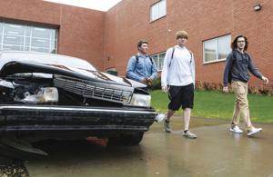 Crashed vehicle raises awareness about safe driving at T. F. Riggs High School