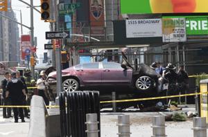 Car drives wrong way in Times Square and hits crowds; 1 dead