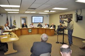 City and county officials meet to approve complicated re-plat in special zone