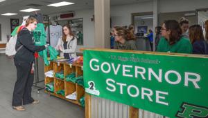 Riggs’ Governor Store peddles team "cheergear" for State appearance
