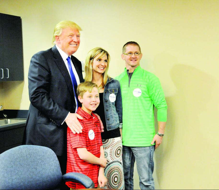 Donald Trump poses with Shay Doyle and his parents, Michele and Casey ... Donald Trump poses with Shay Doyle and his parents, Michele and Casey ...