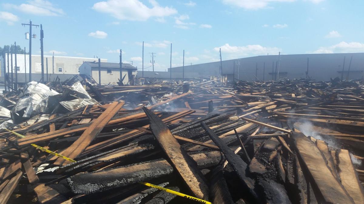 Massive fire consumes lumber yard, burns through the night The