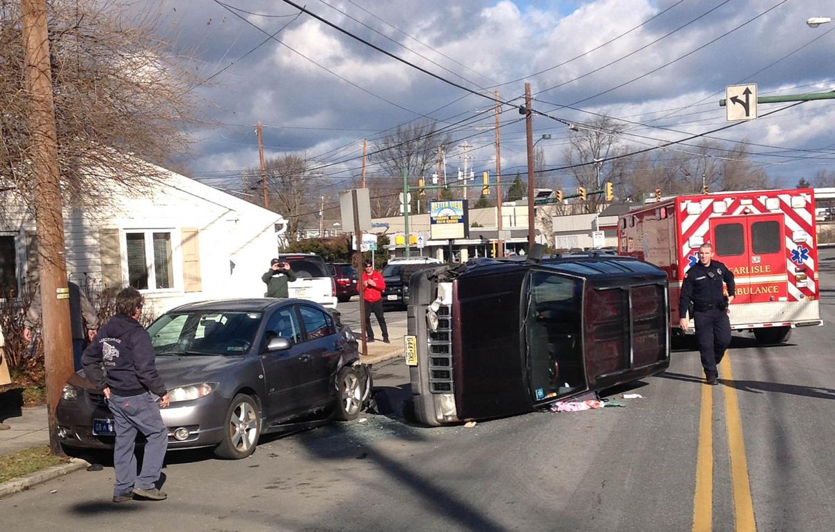 SUV overturns in downtown Carlisle Friday Carlisle
