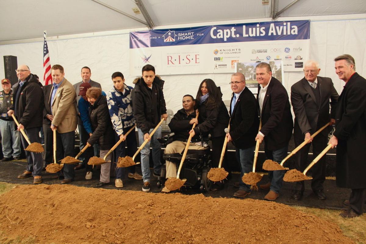 Wounded warrior, family get new home