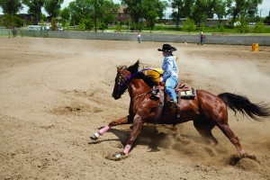 Kailee Koltiska and her horse Jimmy compete in the barrel racing event at the Converse County High School Rodeo at the Wyoming State Fairgrounds June 11. Koltiska will also be competing in the Wyoming High School Rodeo State Finals June 23-26 in the same arrena.